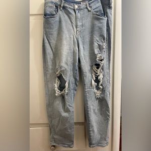 Rip baggy blue jeans